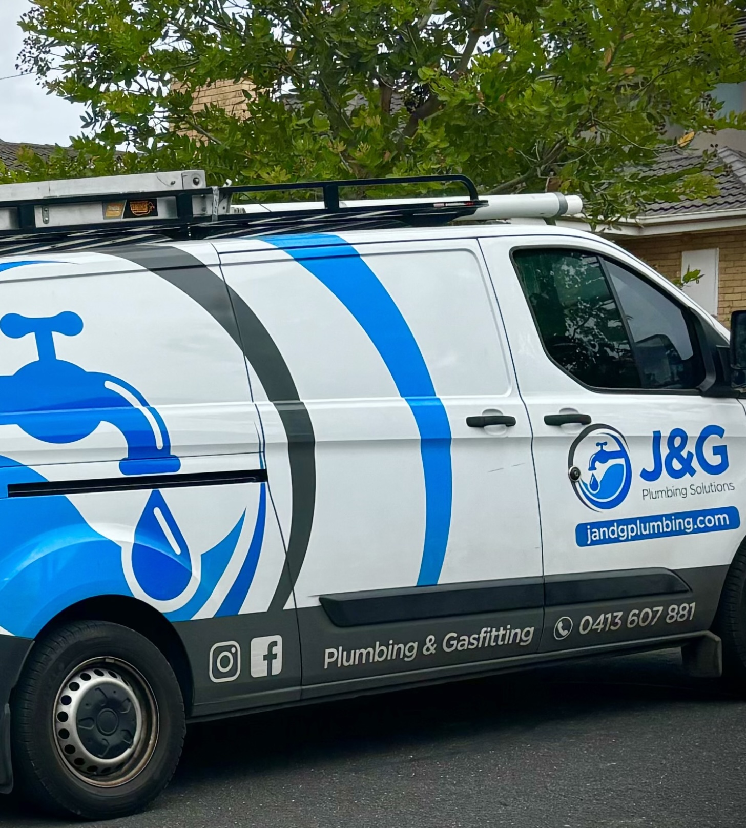 J&G plumbing Solutions plumbing van parked outside a house in Templestowe