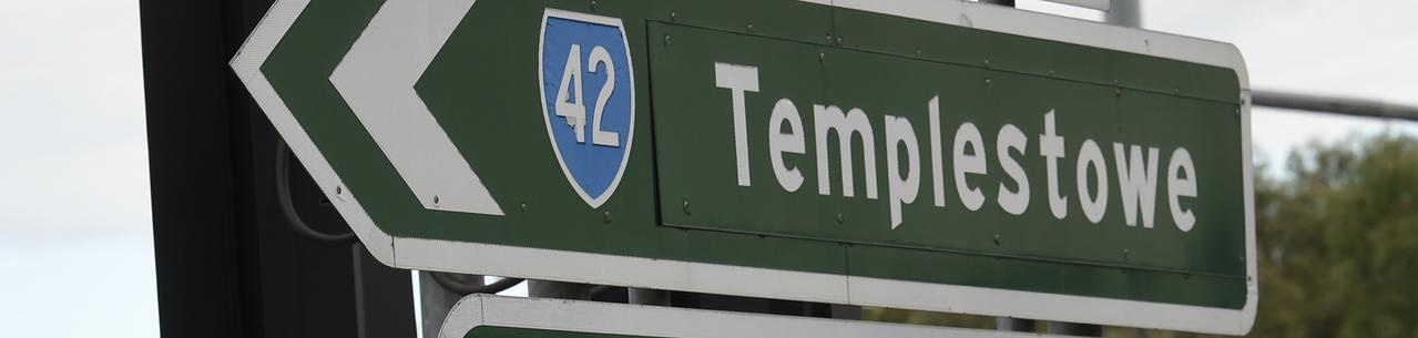 Road sign showing Templestowe in green and cream colours