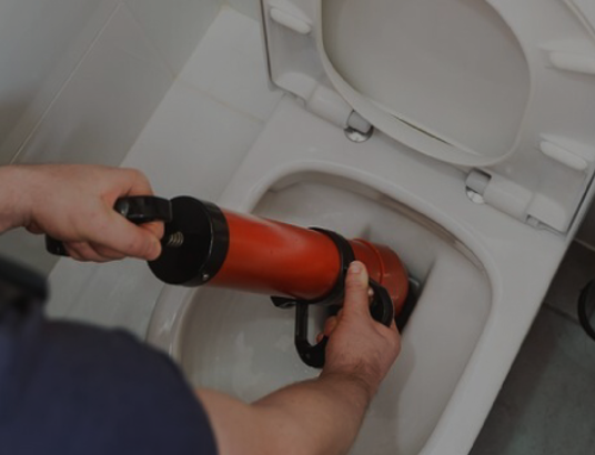 J&G Plumbing Solutions Plumber fixing blocked toilet
